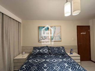 Apartamento térreo mobiliado para venda com 2 suítes e acesso privativo a praia em Praia do Forte Bahia