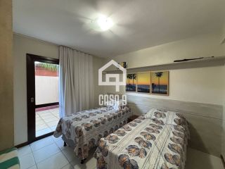 Apartamento térreo mobiliado para venda com 2 suítes e acesso privativo a praia em Praia do Forte Bahia