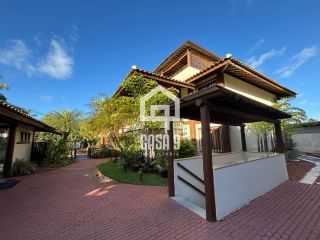 Apartamento térreo mobiliado para venda com 2 suítes e acesso privativo a praia em Praia do Forte Bahia