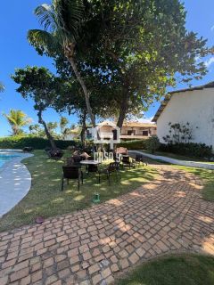 Apartamento duplex a venda com 4 quartos 2 suítes pé na areia na Vila de Praia do Forte Bahia