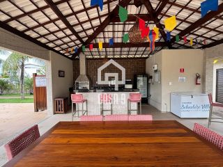 Apartamento térreo mobiliado com 2 suítes varanda gourmet no condominio Belvere na Praia da Espera em Itacimirim