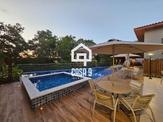 Apartamento garden térreo mobiliado com 2 suites à venda em Itacimirim Bahia