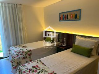 Apartamento garden térreo mobiliado com 2 suites à venda em Itacimirim Bahia
