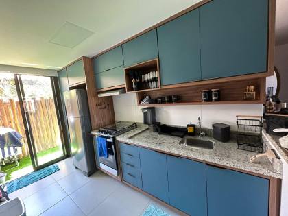Apartamento garden térreo mobiliado com 2 suites à venda em Itacimirim Bahia