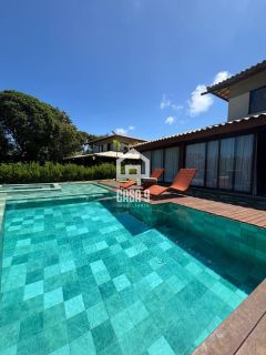 Casa para locação anual com 4 suítes decorada no condominio Alto da Constancia em Praia do Forte Bahia