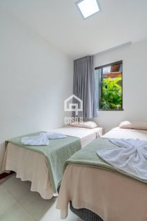 Casa duplex com gardem e 3 quartos pra alugar anual no Condominio Alto da Enseada em Praia do Forte Bahia