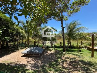 Apartamento térreo com varanda gourmet e 3 quartos (2 suítes) a venda em Itacimirim Bahia