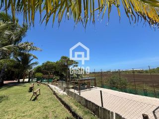 Apartamento térreo com varanda gourmet e 3 quartos (2 suítes) a venda em Itacimirim Bahia