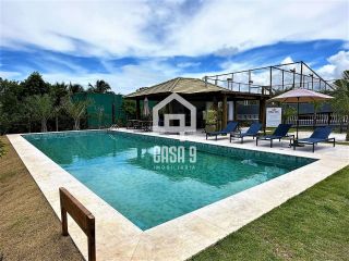 Apartamento novo térreo com 2 quartos a venda no condomínio Village dos Ipes Piscinas Naturais Praia do Forte Bahia