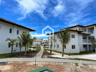 Apartamento novo térreo com 2 quartos a venda no condomínio Village dos Ipes Piscinas Naturais Praia do Forte Bahia