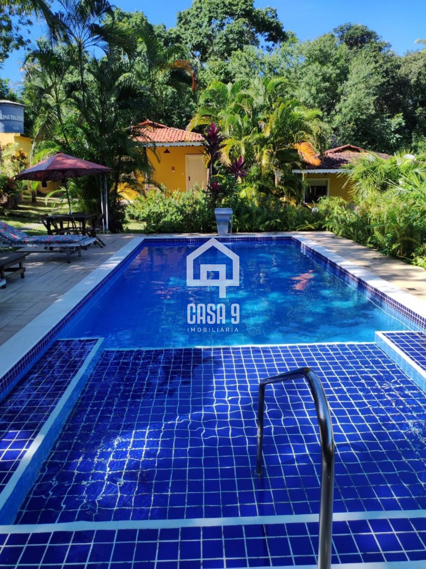 Área de 11000m² com 07 casas em Imbassai-Ba