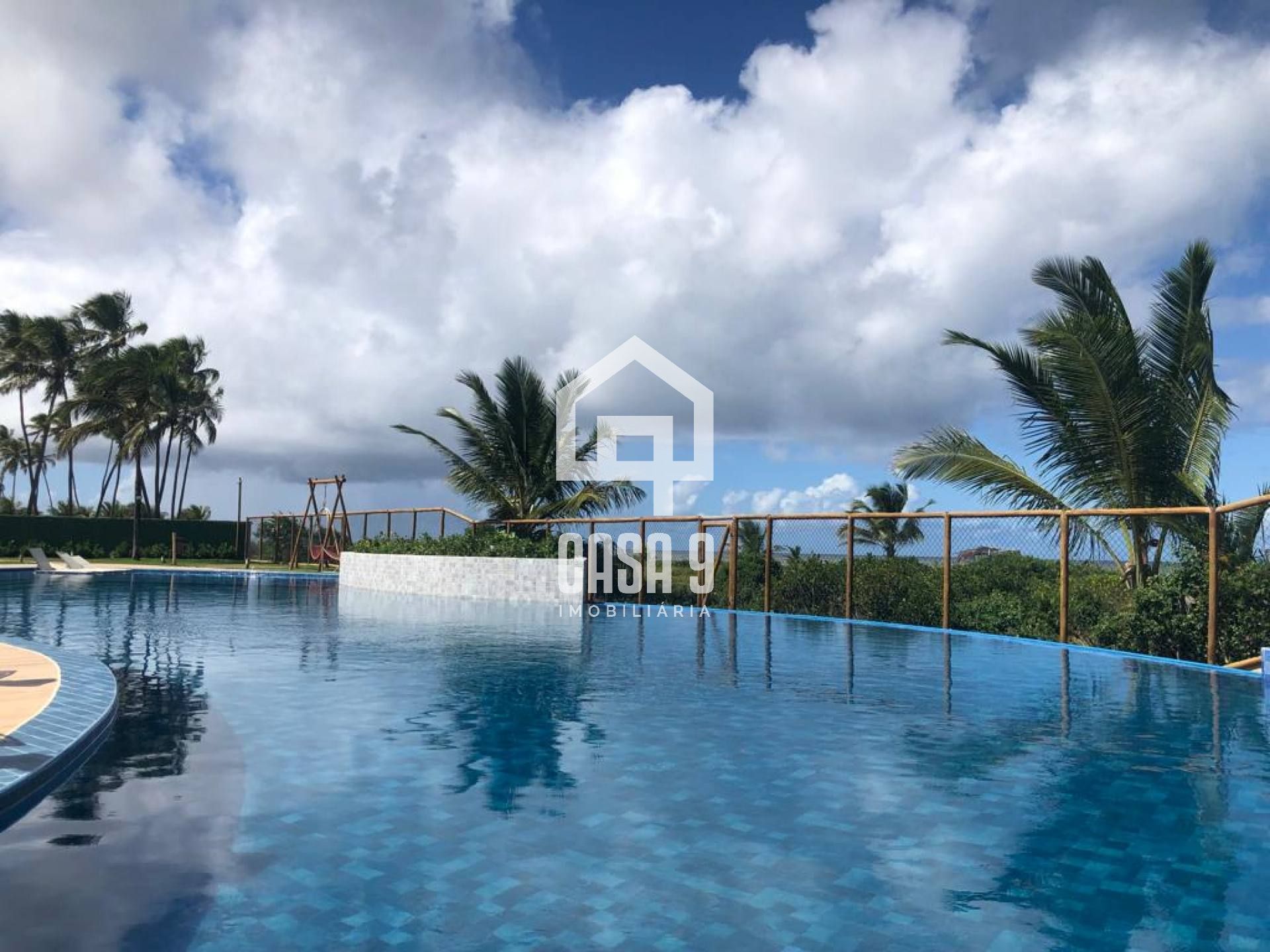 Apartamento mobiliado com 3 quartos pé na areia à venda em Itacimirim Bahia