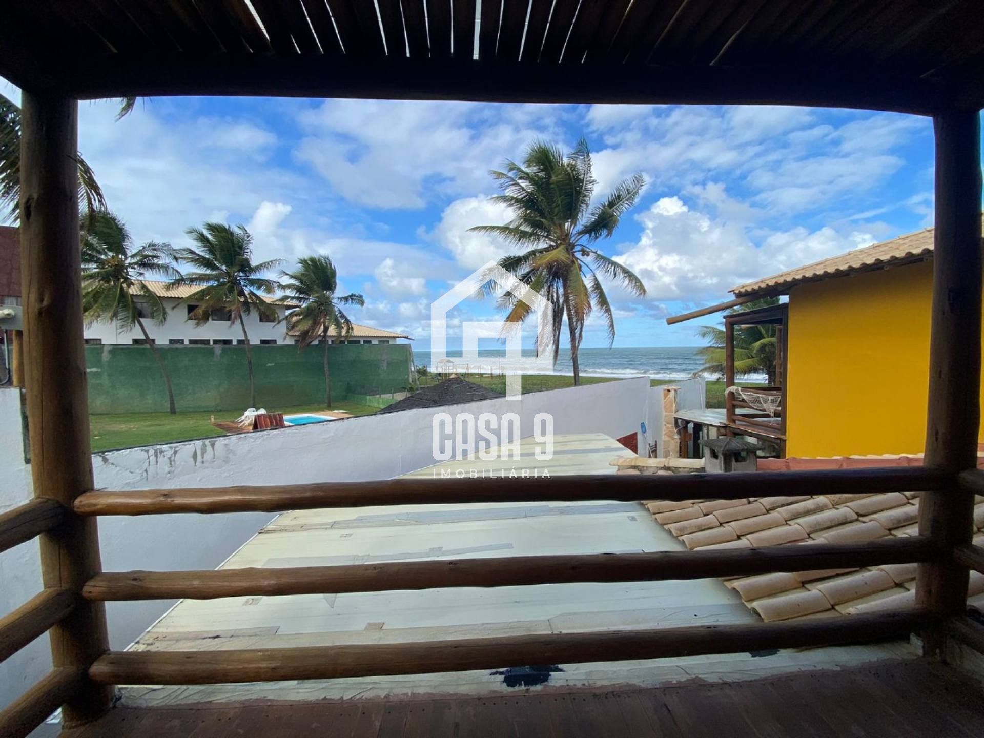 Apartamento térreo duplex vista mar pé na areia com 3 quartos a venda em Itacimirim Bahia