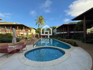 Apartamento térreo mobiliado com 3 suítes a venda no Condomínio Lua Cheia pé na areia em Itacimirim Bahia