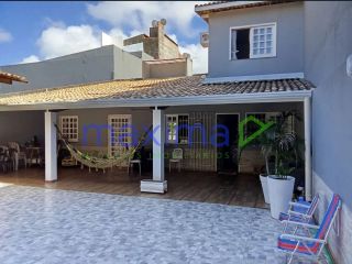 Excelente oportunidade de investimento! Casa 3/4 com suite e prédio comercial na frente