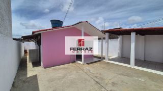 Casa em condomínio na coophab, sala, dois quartos, banheiro social, cozinha e área de serviço, quintal, garagem coberta. Condomínio simples.