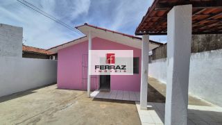 Casa em condomínio na coophab, sala, dois quartos, banheiro social, cozinha e área de serviço, quintal, garagem coberta. Condomínio simples.