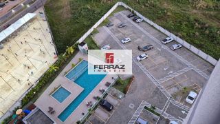 Apartamento para locação no bairro de Ponta Negra, sala com varanda, dois quartos, uma suíte, lazer, elevador, portaria 24h presencial