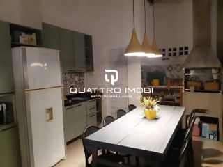 Casa com piscina no bairro Suíssa