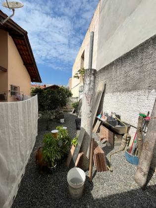Casa Com 1 Suíte + 2 Dormitórios no Centro de Penha