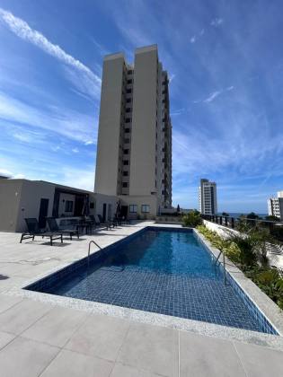 Apartamento com vista mar aprox. 300m da praia de Armação, com 3 dormitórios e 2 vagas de garagem em Penha/SC. Ref. 399