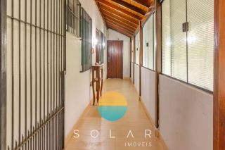 CASA NO ALTO DO MORRO NA PRAIA GRANDE!