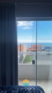 Apartamento mobiliado com ampla vista para o mar no Quilombo
