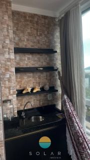 Apartamento mobiliado com ampla vista para o mar no Quilombo