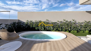 Casa moderna com 3 quartos sendo 1 suíte e área de lazer com piscina.