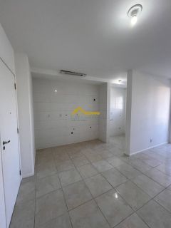 Apto 2 dormitórios, elevador, sacada com churrasqueira e garagem coberta