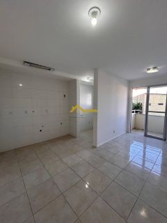 Apto 2 dormitórios, elevador, sacada com churrasqueira e garagem coberta