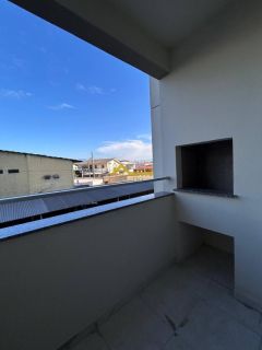 Apto 2 dormitórios, elevador, sacada com churrasqueira e garagem coberta