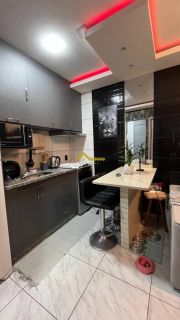 Apartamento com móveis sob medida na Praia do Sonho .