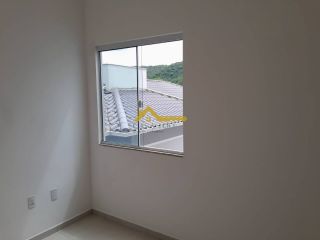 Sobrado com duas suítes em São José .