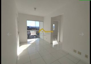 Apartamento com sacada e churrasqueira .