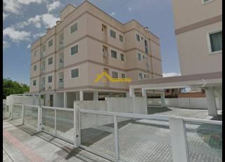 Apartamento com sacada e churrasqueira .