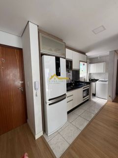 Apartamento com sacada .