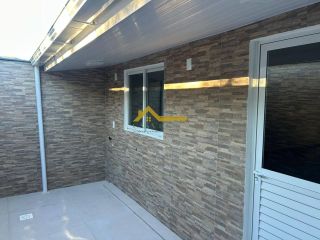 Casa reformada e com suíte .