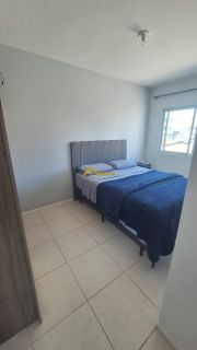 APARTAMENTO COM SACADA EM FORQUILHAS E PISCINA.