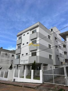 Apto novo, dois dormitórios, sacada com churrasqueira e vaga de garagem livre