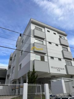 Apto novo, dois dormitórios, sacada com churrasqueira e vaga de garagem livre