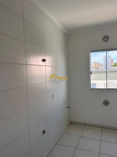 Apto novo, dois dormitórios, sacada com churrasqueira e vaga de garagem livre