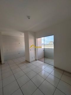 Apto novo, dois dormitórios, sacada com churrasqueira e vaga de garagem livre