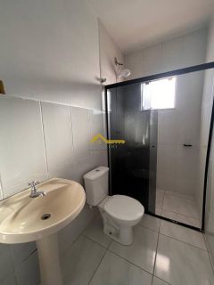 Apto dois dormitórios com suíte, sacada e churrasqueira.