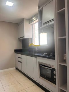Apto dois dormitórios, móveis planejados cozinha e vaga livre de garagem