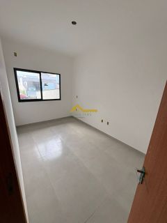 Casa em Palhoça com churrasqueira a carvão .