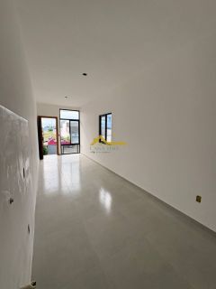 Casa em Palhoça com churrasqueira a carvão .