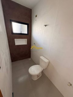 Casa em Palhoça com churrasqueira a carvão .