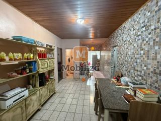 Casa no bairro Flodoaldo Pontes Pinto com terreno de 250m²