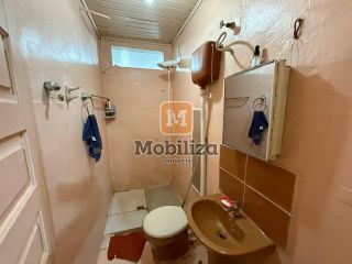Casa no bairro Flodoaldo Pontes Pinto com terreno de 250m²